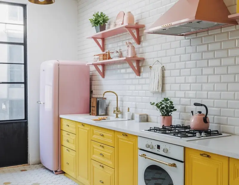 Yellow Kitchen Cabinets with Pink Appliances | Bold Color Kitchen Design Ideas | Cozy Home Styling Tips