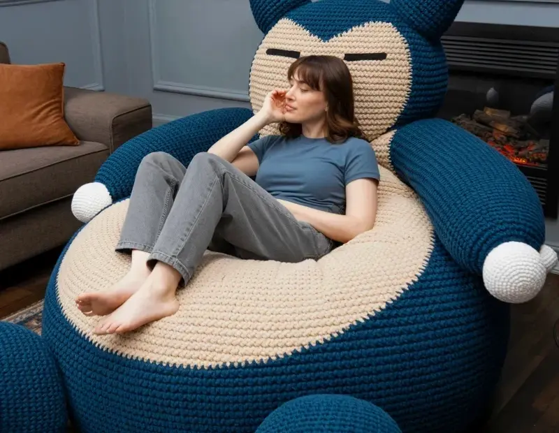 Giant knitted Snorlax bean bag chair in navy & cream | cozy room decor idea